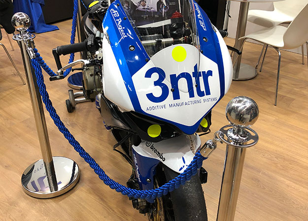 A motorcycle featuring 3D printed parts from 3NTR at Formnext 2019